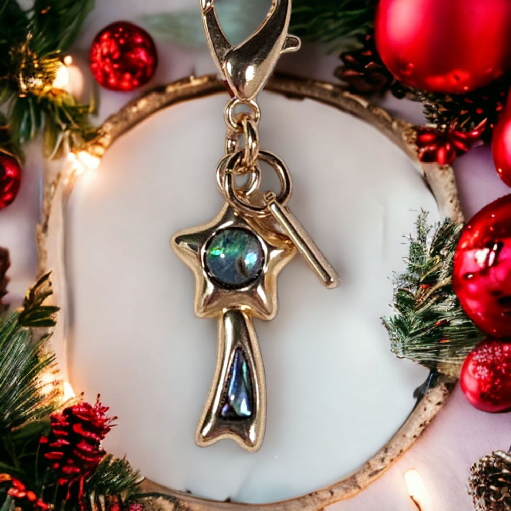 Coach shooting star small gold-tone purse/wallet charm